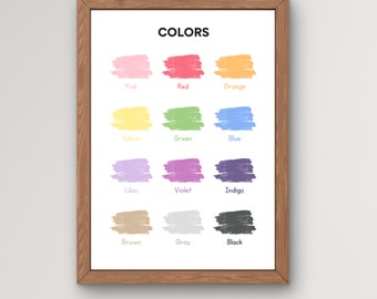 May include: A framed chart with the word "COLORS" at the top. The chart shows 12 different colors with their names written below each color swatch. The colors are pink, red, orange, yellow, green, blue, lilac, violet, indigo, brown, gray, and black.