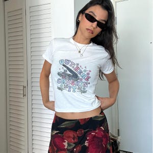 Retro Groovy Flower LPN Baby Tee, Funny Medication Aide Shirt for Women, Nurse Life Graphic Top, Healthcare Worker Crushin&#39; It Tee