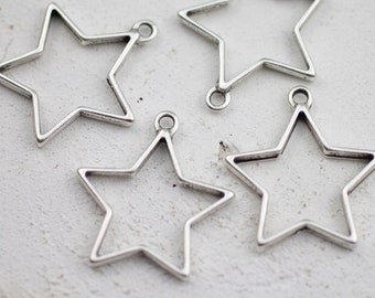 10 marcos huecos con pegamento en blanco, conectores para colgantes, engaste de bisel abierto, bisel de resina de estrella plateada, accesorios de joyería, venta al por mayor ZM531 AS