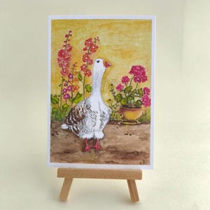 Stampa ad acquerello di un'oca, cartolina di uccelli boho, illustrazione floreale di animali, decorazione da parete in stile cottagecore, arte naturalistica, opera d'arte con un'oca per bambini