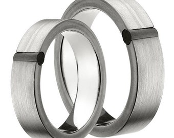 Titanium wedding rings with carbon