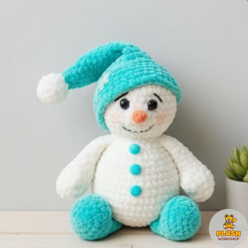 Easy DIY snowman amigurumi crochet pattern PDF, blue hat cute snowman stuffed plush, no sew beginner crochet project, handmade snuggler buddy cartoon winter toy, crochet snowman ornament, step by step digital amigurumi tutorial, gift for crochet lovers, nursery decor plush toy, home decoration handmade crochet snowman
