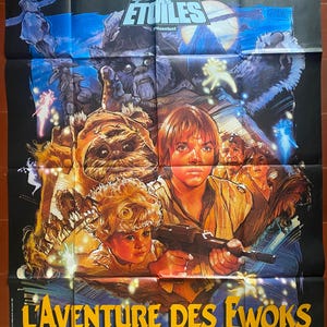 May include: A vintage movie poster for the film "The Ewok Adventure", featuring a blue and black background with the text "Les créateurs de la trilogie" and "GUERRE DES ÉTOILES" in white. The poster also features a group of characters from the film, including the Ewoks, Wicket, and Cindel.