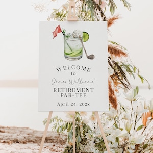 Peut inclure: Panneau de bienvenue pour une fête de retraite, avec une illustration de cocktail sur le thème du golf. Le panneau indique "Welcome to James Williams Retirement Par-Tee" avec la date du 24 avril 202x. Le panneau est sur un chevalet en bois, décoré de fleurs.
