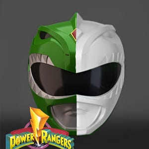 May include: A Power Rangers helmet, split vertically, with the left side green and the right side white. The green side has a stylized dragon design, while the white side has a sleek, smooth finish. The Power Rangers logo is at the bottom.