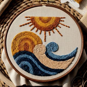 May include: Embroidered artwork in a wooden hoop, depicting a sun and ocean waves. The sun is yellow and orange, the waves are blue and tan. A decorative piece for the home, with a natural, earthy aesthetic.