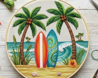 May include: Embroidered artwork in a wooden hoop depicts a beach scene with two surfboards, palm trees, and ocean waves. The surfboards are orange and teal. The sand is tan, and the sky is light blue.