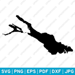 May include: A black and white silhouette of a lake with a long, narrow shape. The lake is surrounded by land, and there are several inlets and bays along its shoreline.