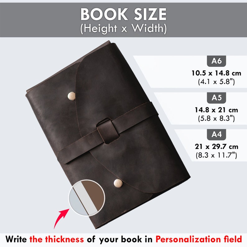 May include: A brown leather journal with a strap closure and a flap. The journal is shown with a white and brown spine. The image includes a chart showing the different sizes of the journal in inches and centimetres. The text "Write the thickness of your book in Personalization field" is at the bottom of the image.