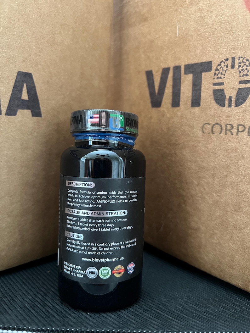 May include: A black bottle with a blue lid and a white label. The label has the text "AMINOPLEX" and information about the product, including dosage and administration instructions. The bottle is labeled as a product of Biovet Pharma, Miami, FL, USA.