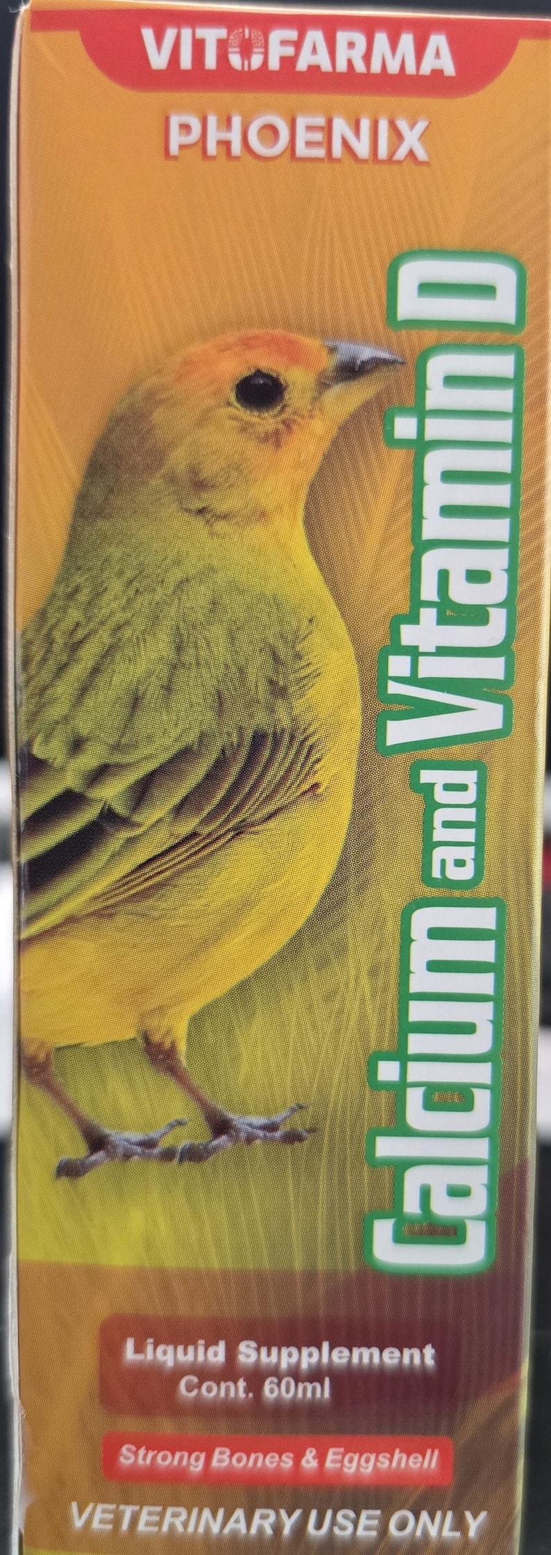May include: A product label for a liquid supplement for veterinary use. The label features a yellow bird illustration and text that reads "Calcium and Vitamin D". The product contains 60ml and is for strong bones and eggshell.