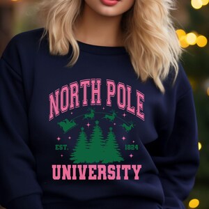 North Pole Shirt Pink Christmas Sweatshirt Cute Xmas Shirt Santa Reindeer Shirt Holiday Shirt Women Holiday Sweater Xmas Teen Gift Pink Xmas
