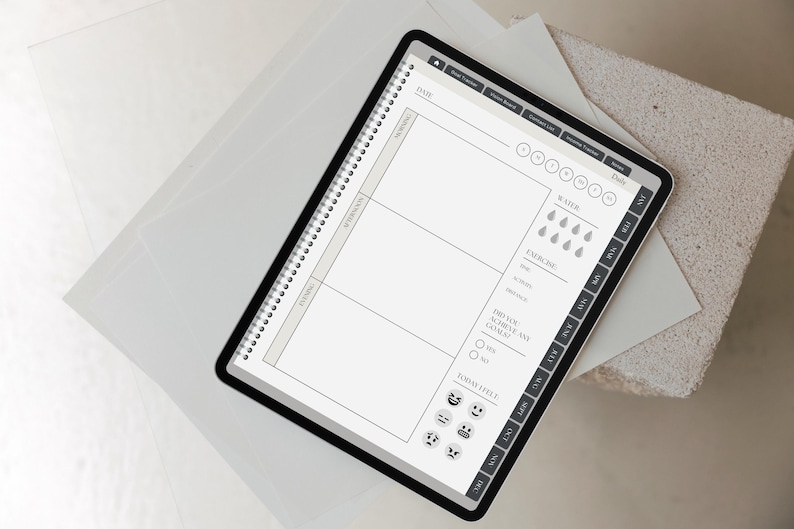 May include: A digital tablet displaying a daily planner template with sections for morning, afternoon, and evening. The interface includes trackers for water intake, exercise, and mood, featuring icons for date, weather, and daily goals in a clean layout.