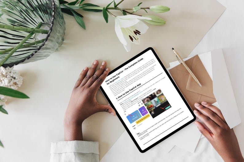 May include: A tablet displaying a guide on how to use the CapCut app. The guide is titled "How to Use CapCut - The Complete Guide for Beginners" and includes a section titled "1. How to Use CapCut App".