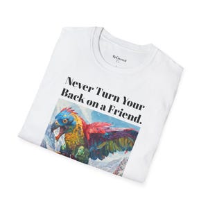 May include: White t-shirt featuring a colourful parrot graphic and the text "Never Turn Your Back on a Friend."