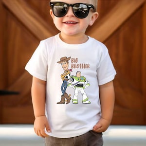 May include: A rustic wooden sign with the text "Welcome to our home" in white lettering. The sign features a distressed finish and a simple, inviting design, perfect for entryway decor.