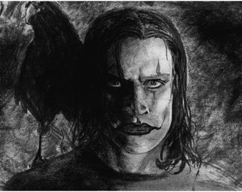 May include: A black and white pencil drawing of a man with long dark hair. He has dark makeup around his eyes and a dark line across his mouth. A crow is partially visible in the background.