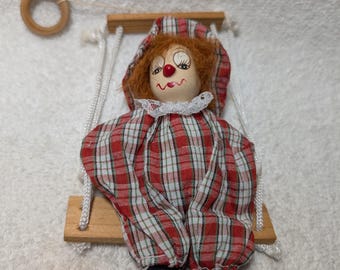 Vintage Porcelain And Cloth Clown Doll Sitting On a Swing