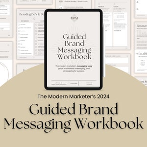 May include: A digital tablet displays the cover of the "Guided Brand Messaging Workbook." The workbook's title is in large, elegant font. The background features worksheets and text about branding. The text reads "The Modern Marketer's 2024 Guided Brand Messaging Workbook."