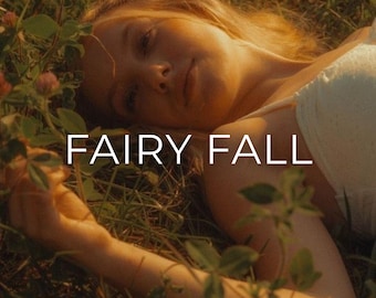 May include: A person lying in grass with the text "FAIRY FALL" in white. The image has a warm, golden tone. The text "20 Lightroom Presets | Mobile & Desktop" is at the bottom.