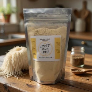 May include: A clear, resealable bag filled with light brown powder labeled "Lion's Mane 100:1" and "Shaggy's Herbals." A small jar and wooden spoon with brown granules are next to the bag. A bundle of light-colored, dried noodles sits to the left.