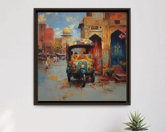 Könnte beinhalten: Ein gerahmter Kunstdruck zeigt eine farbenfrohe Straßenszene mit einem Tuk-Tuk. Das Kunstwerk verwendet eine lebendige Palette aus Blau-, Gelb- und Rottönen, die das Wesen einer geschäftigen Stadt einfängt. Der Druck ist in einem schwarzen Rahmen eingefasst.