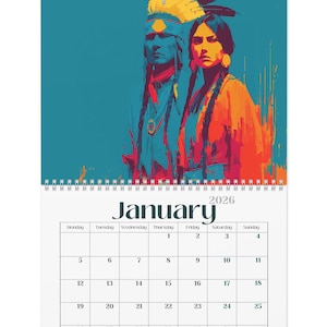 Peut inclure: Calendrier 2026 avec une illustration de deux figures amérindiennes aux tons de bleu, orange et rouge. La grille du calendrier affiche le mois de janvier.