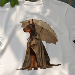 Doberman Pinscher Dog in Coat with Umbrella Tshirt, Unique Dog Lover Gift Tee, Cool Dog Art Shirt, Pet Owner Apparel, Stylish Canine Print