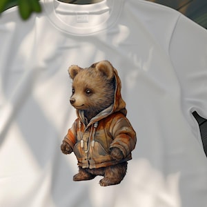 Schattige beer draagt jas met capuchon, schattige beer cartoon grafisch T-shirt, bruine beer kunst T-shirt, kindertopjes dieren design, cadeau-idee voor beer