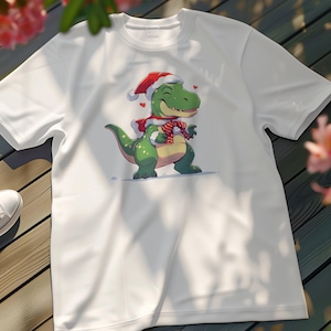 Cute Dinosaur in Christmas Hat T-Shirt, Holiday Themed Dino Tee, Festive T-Rex Graphic Shirt, Merry Christmas Dino Top, Fun Xmas Gift