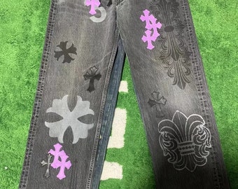 Limited edition black and purple painted jeans, pink checkerboard pony hair jeans, brown overalls