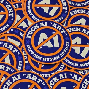 May include: A collection of round stickers with a blue and orange design. The stickers have the text "FUCK AI 'ART'" and "SUPPORT HUMAN ARTISTS". The center of the sticker has a white "AI" symbol with a red slash through it.