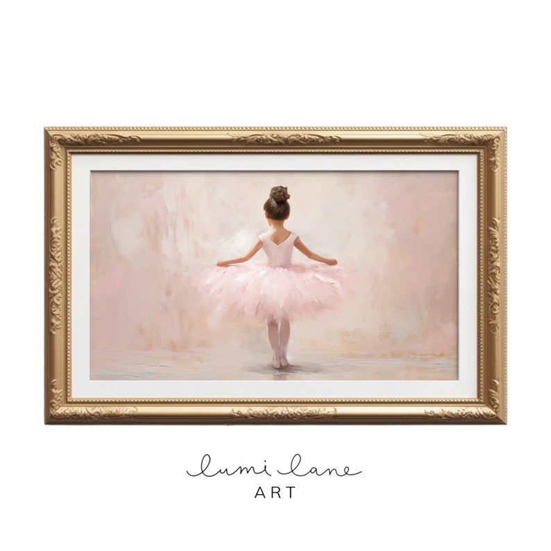 May include: A framed painting of a young ballerina wearing a pink tutu and standing on a stage. The background is a soft pink and the frame is gold.