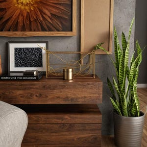 May include: A white ceramic mug with a black handle and the text "But First, Coffee" in a bold, black font. The mug is set against a blurred background, suggesting a cozy setting.