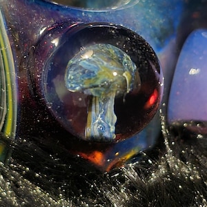 Handblown glass sherlock pipe with a mushroom marble and 3 horns