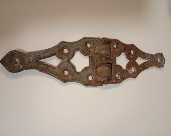 One only Antique Ornate Strap Hinge- 7-5/8 inches long x 2 inches wide at widest point