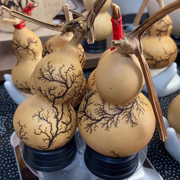 Gourd Art Piece with Lightning Strike Patterns - Nature-Inspired Decor. Embrace the Enchanting Beauty of Natural Forces.