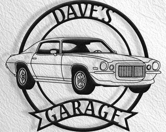 May include: Black metal silhouette of a classic car with the words "Dave's Garage" in a circle around it.