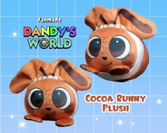 May include: Two brown cocoa bunny plush toys with large black eyes, white facial markings, and long ears. The text Fanmade Dandy's World and Cocoa Bunny Plush is visible. The plush toys have a round shape and a soft texture with stitched details.