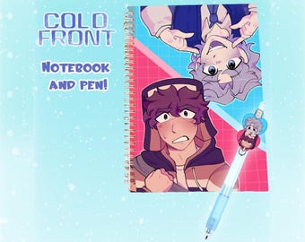 May include: A spiral-bound notebook and pen set. The notebook cover features anime-style illustrations of two characters against a pink and blue background. The pen is light blue with a charm of a character. The text "COLD FRONT NOTEBOOK AND PEN!" is visible.
