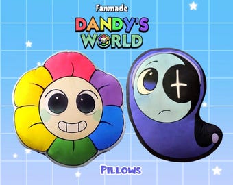 May include: Two plush pillows with cartoon designs. One is a colorful flower with a smiling face. The other is a purple ghost-like character with a sad expression and a cross on its face. The text "Fanmade Dandy's World" and "Pillows" are also visible.