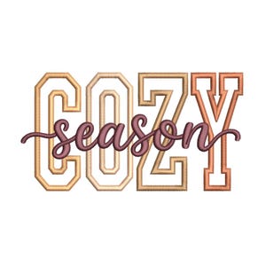May include: An embroidery design featuring the word COZY in large, block-style letters with a gradient of tan, beige, and orange tones. The word season is written in a dark brown, cursive script that overlays the center of the block letters.