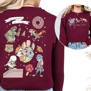 a maroon sweatshirt with a variety of cartoon animal characters, including a police officer, a police dog, and other animals, along with various objects and text.