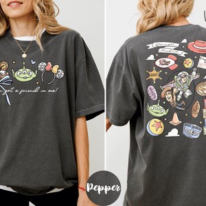 The image is a collage of two photos featuring a woman wearing a gray t-shirt with various cartoon characters and text printed on it.