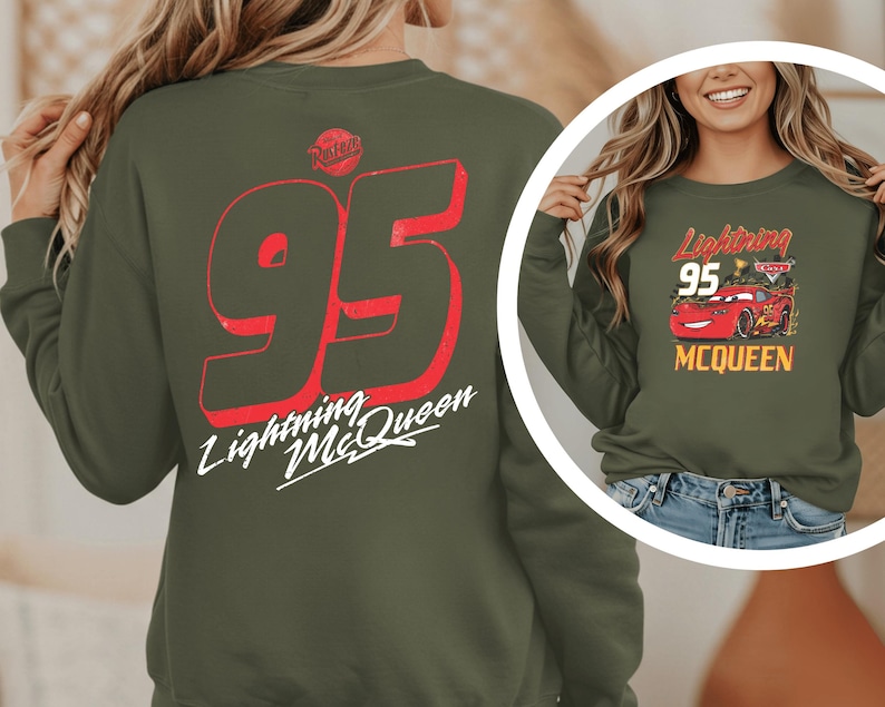 A woman wearing a green sweatshirt with a red and white design on the back, featuring the number 95 and the text "Lightning McQueen".