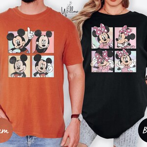 two people wearing t-shirts with Mickey Mouse and Minnie Mouse designs.