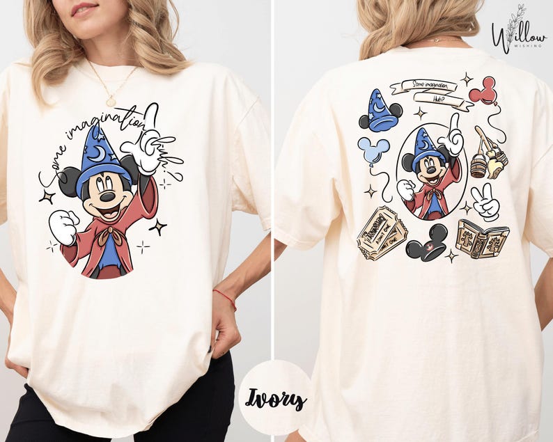 A woman wearing a white t-shirt with a cartoon character and text printed on it.