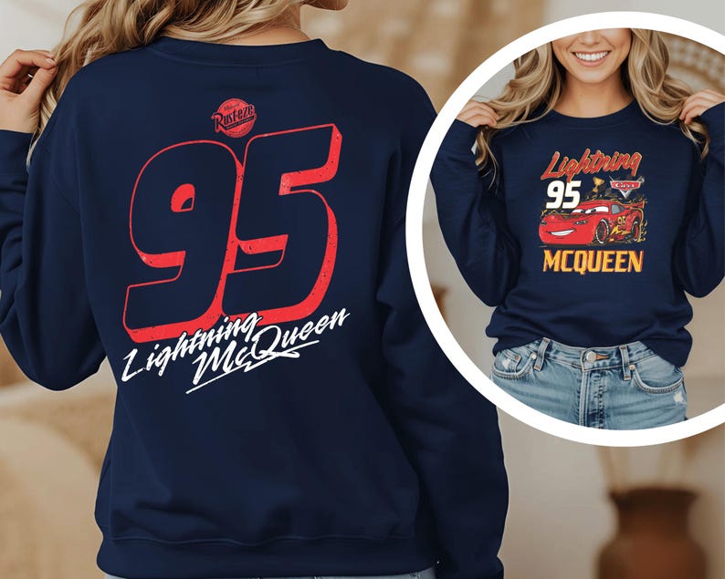A woman wearing a navy blue sweatshirt with the number 95 and the text "Lightning McQueen" printed on it.