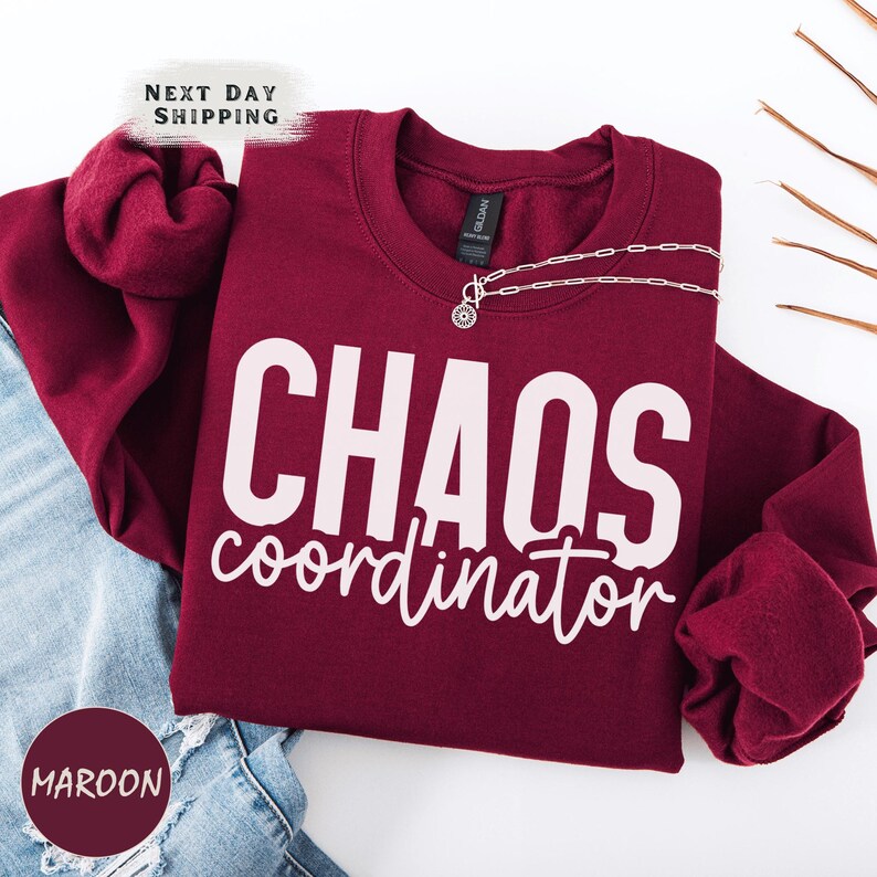 a red shirt that says chaos coordination on it