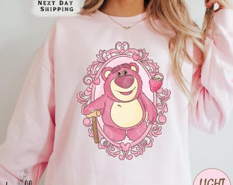 Cozy Toy Story Sweatshirt With Retro Strawberry Bear Design, Disney Family Vacation Pullover Perfect For Magical Days Fans Of Lotso